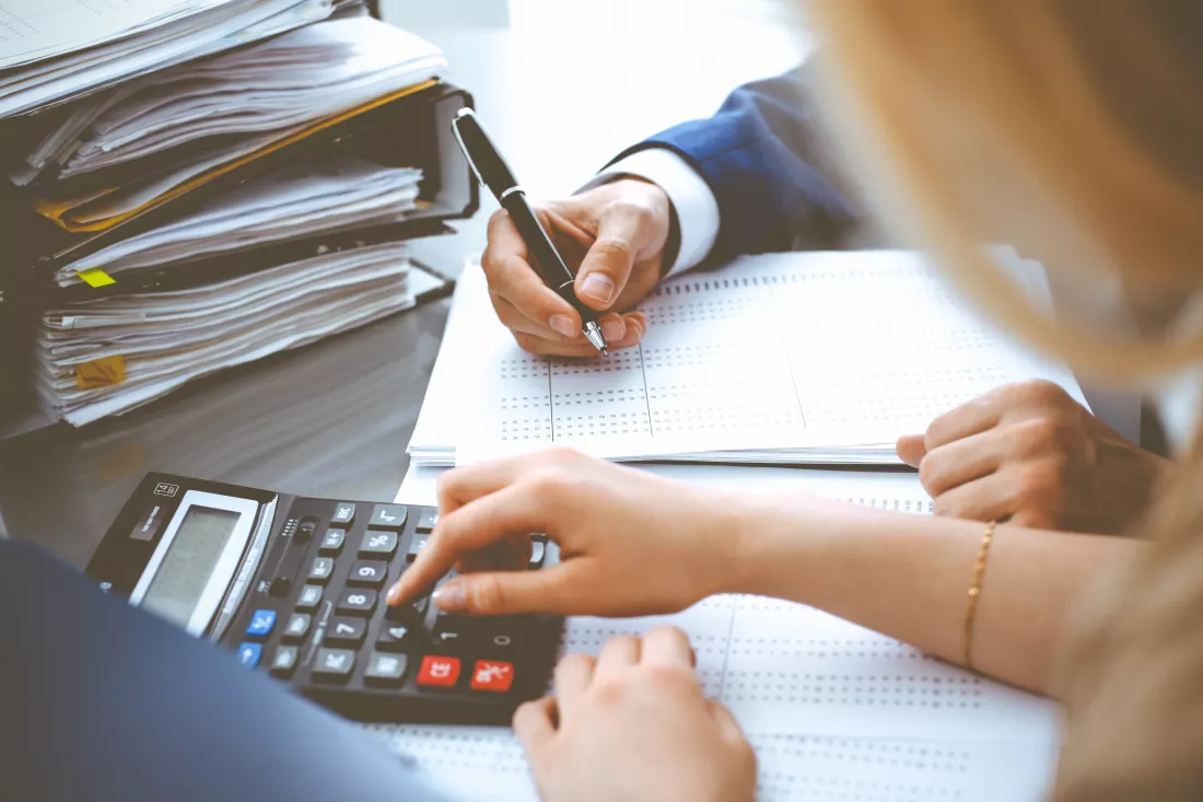 bookkeeper-financial-inspector-secretary-making-report-calculating-checking-balance-internal-revenue-service-inspector-checking-financial-document-business-tax-audit-concepts