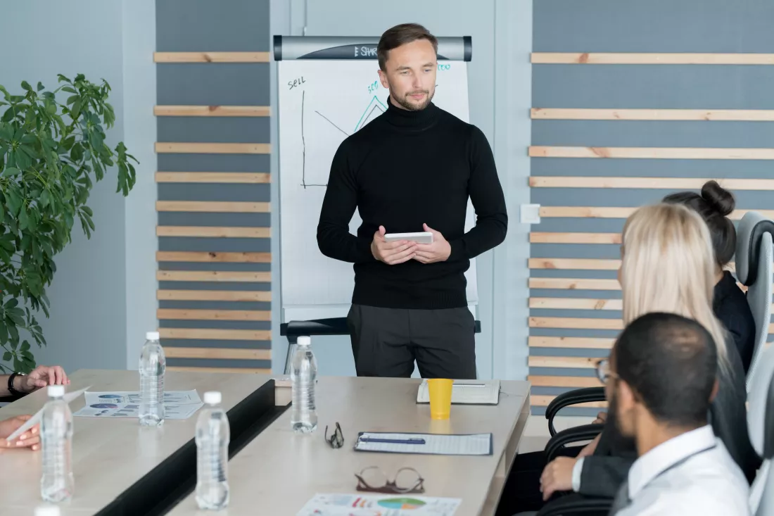handsome-company-leader-running-meeting