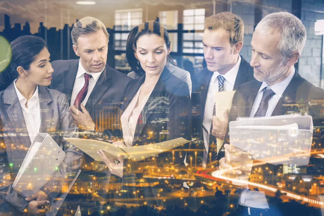 lawyer-looking-documents-interacting-with-businesspeople-office